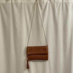 Cute brown leather purse with tassel and basketweave detailing, crossbody